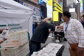 Partners pumping elbows to say hello at our Community First event in Times Square