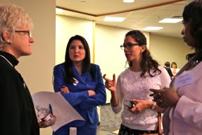 Summit attendees speak to Penny Rayfield (left) from the Texas Association of Business.