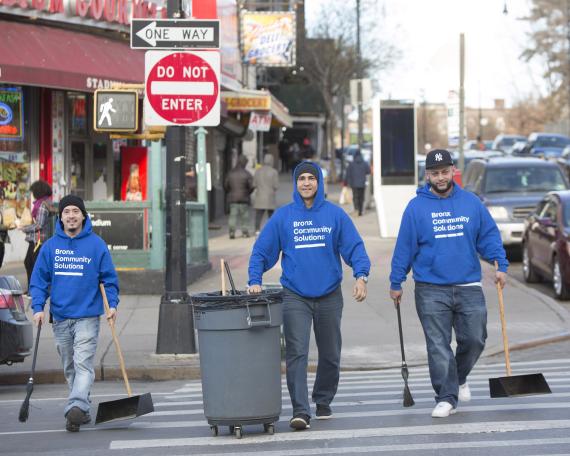 Bronx Community Solutions creates community improvement projects that address local needs. Projects include painting over graffiti, packing food and care kits, and assisting with community events.
