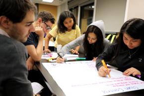 Group of Youth Justice Board members work together on a project