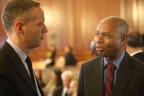Greg Berman, director of the Center for Court Innovation, confers with Bronx D.A. Robert Johnson.